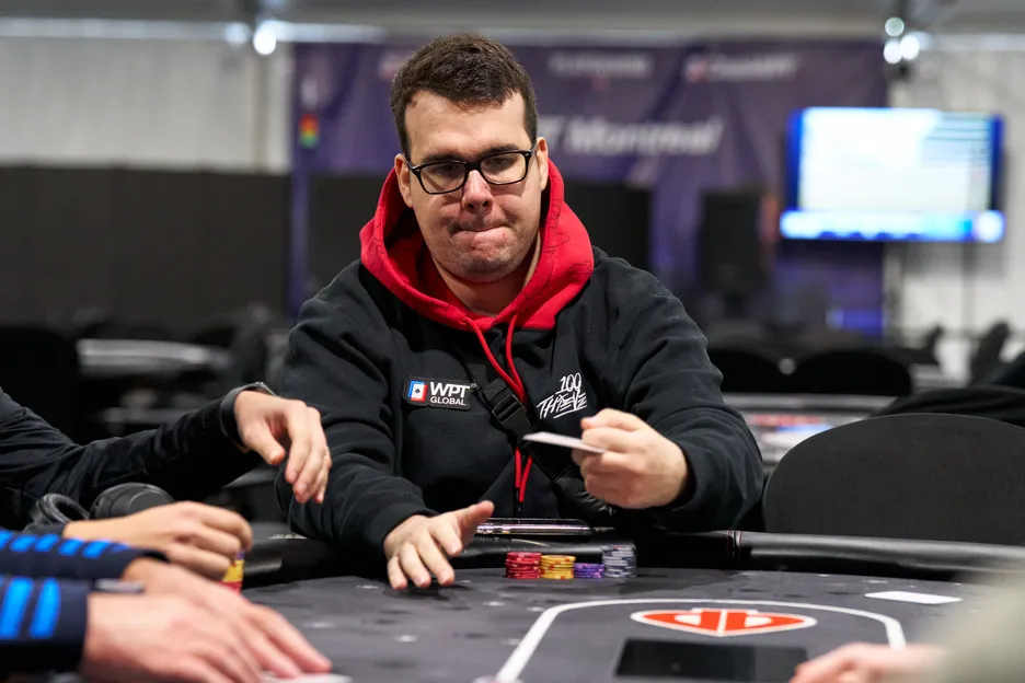 poker player throwing in a fold